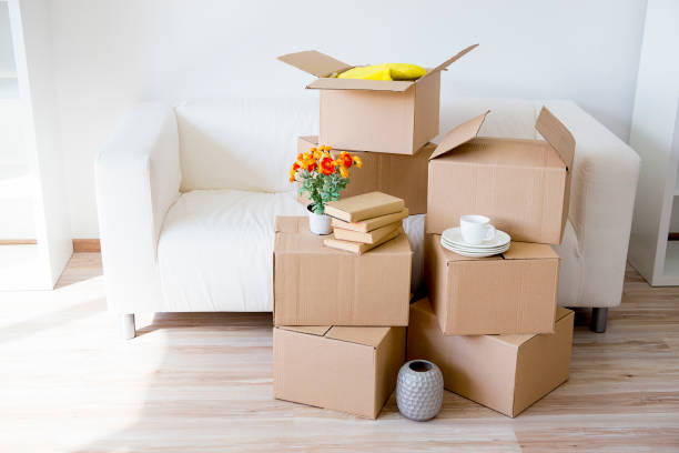 istock Cardboard boxes - moving to a new house 884518316