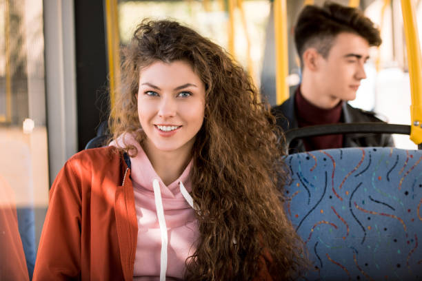 istock girl in city bus 884521102