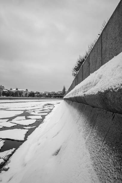 istock Moscow river at winter with ice floe black and white tonned 884527638