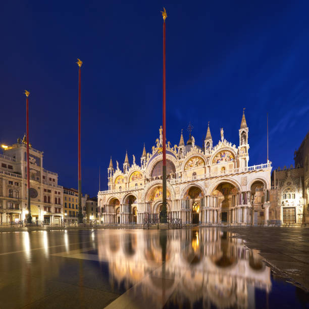 istock Basilica in San Marco square in Venice with reflection at twilight 884528496
