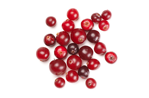 Red ripe cranberries close-up isolated on white background. Top view point.