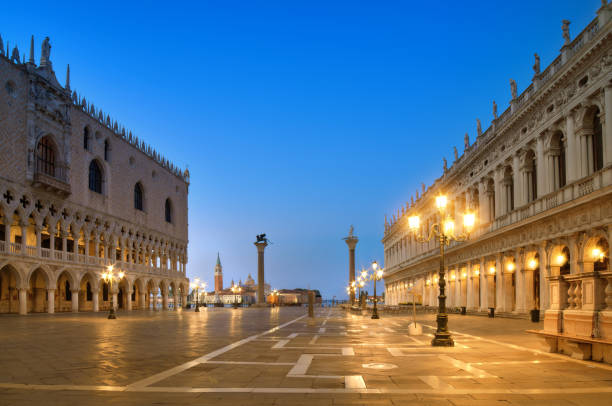istock Illuminated St. Marks square in Venice, Italy 884539162