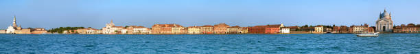 istock Long panoramic image of Guidecca island in Venice 884539350