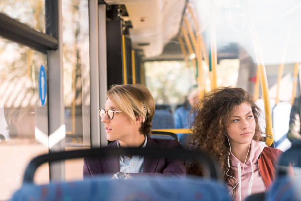 istock young couple in bus 884560056