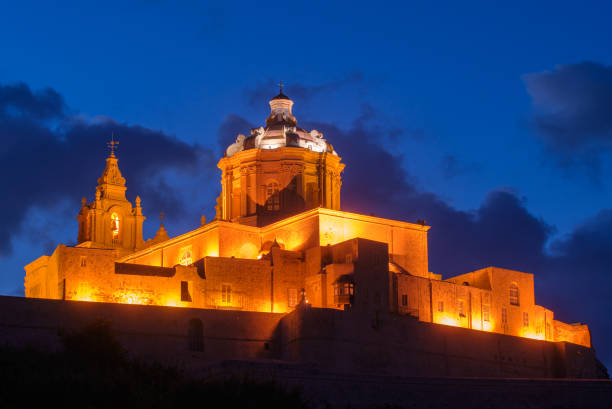 istock St. Paul's Cathedral at the night. Mdina, Malta 884564720