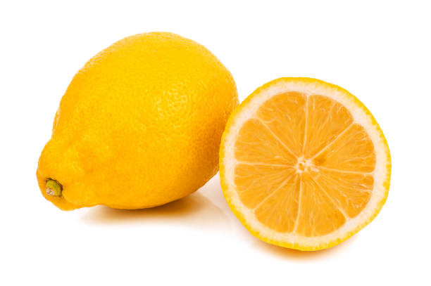 limone succoso maturo isolato - lemon portion cross section isolated foto e immagini stock