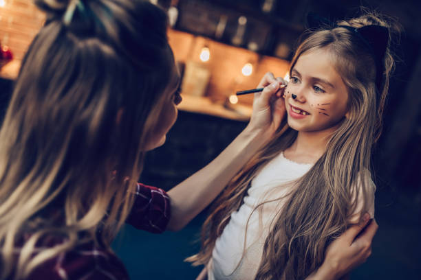 istock Mom with daughter on Halloween. 884618546