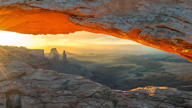 istock Sunrise at Mesa Arch, Utah 884618726