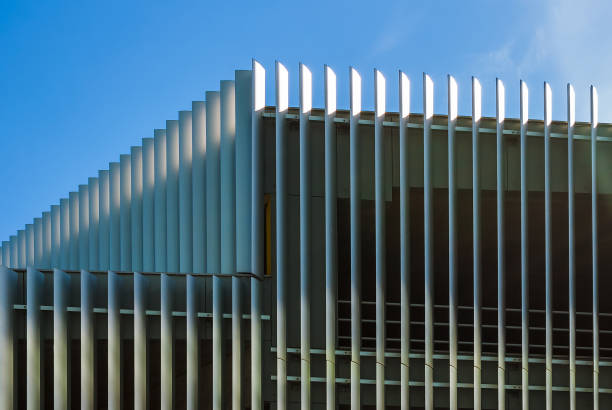 istock Steel facade of parking building 884619490