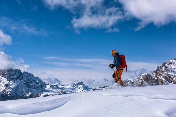 istock Young Man Ski Touring in Dolomites, italy 884626994