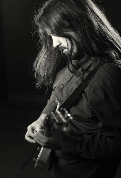 istock Portrait of a Young Guitarist 884635378