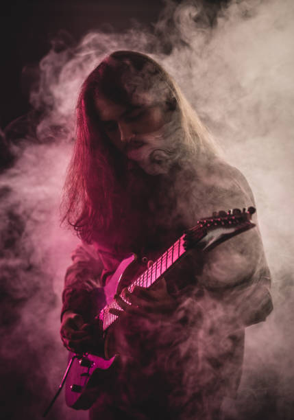 istock Portrait of a Young Guitarist 884635612