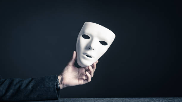 istock Mask and businessman 884641200