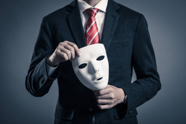 istock Mask and businessman 884641286