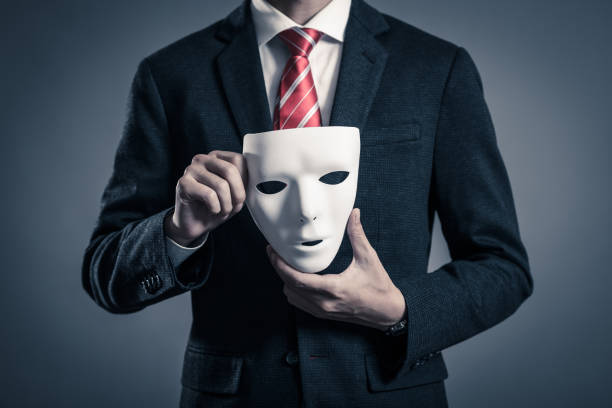 istock Mask and businessman 884641326