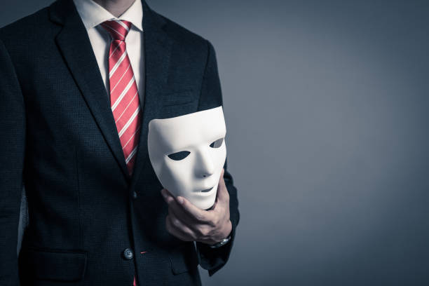 istock Mask and businessman 884641424