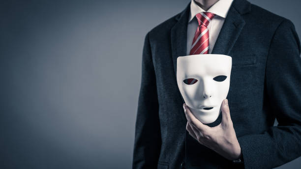 istock Mask and businessman 884641508