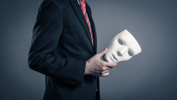 istock Mask and businessman 884641558