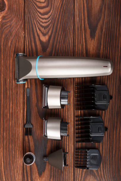 istock Trimmer with a set of baits on a wooden background. View from above 884641568