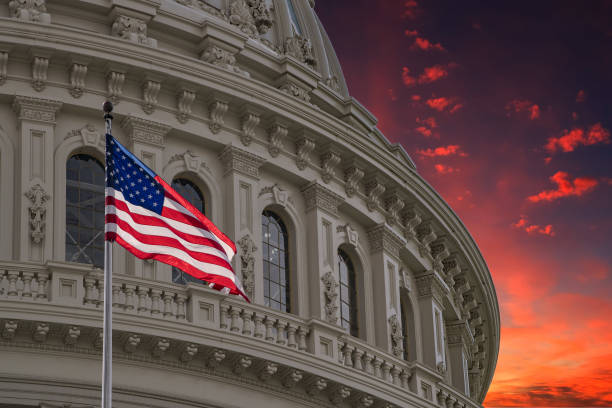 istock Washington DC Capitol view on cloudy sky background 884646670