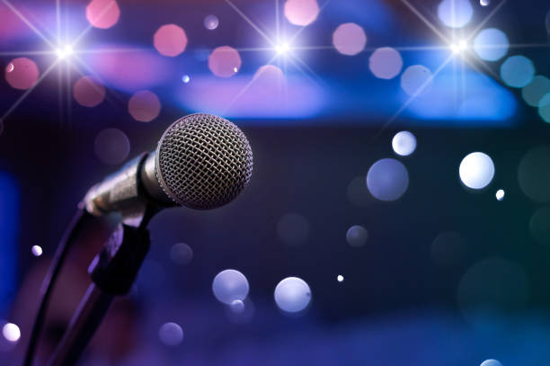 istock communication microphone on stage against a background of auditorium Concert stage 884647054