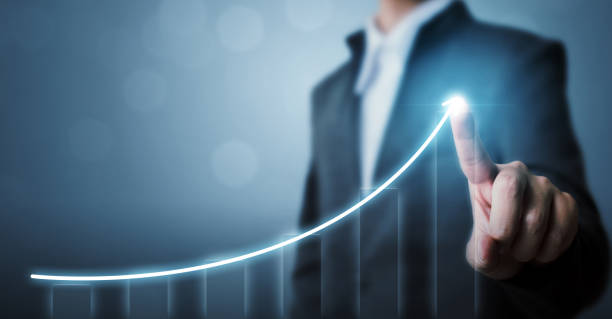 istock Business development to success and growing growth concept, Businessman pointing arrow graph corporate future growth plan 884650780