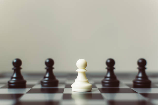 istock Chess board game white pawn different black pawn, Unique, think different, individual and standing out from the crowd concept 884651572