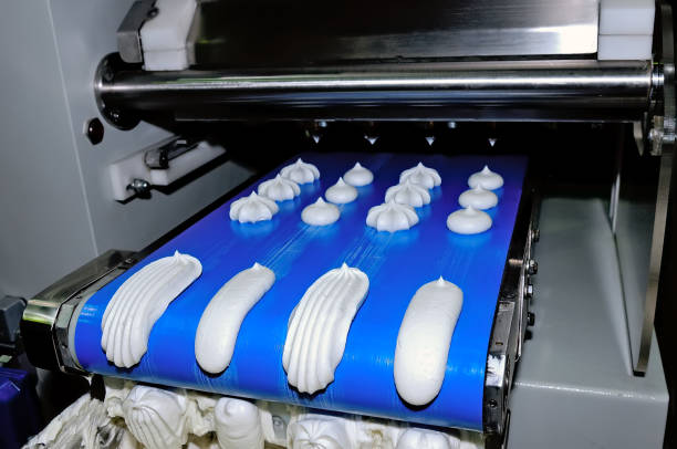 istock Confectionery production of meringue on the baking machine 884655776
