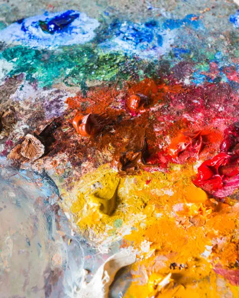 background of the artist's oil paints on a palette