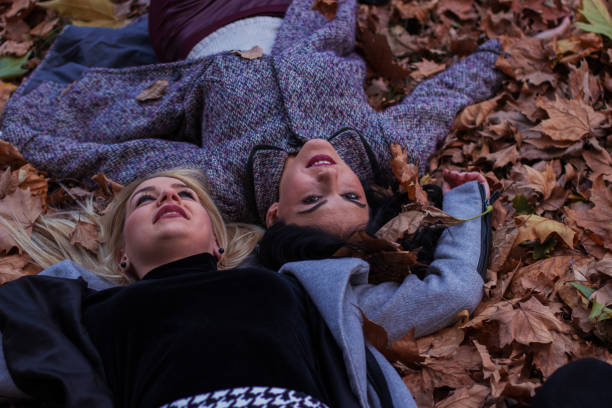 istock Two girls in the park 884674048
