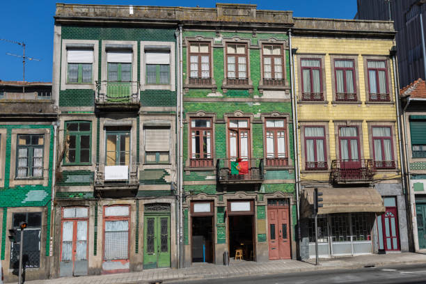 istock Typical Colorful Portuguese Architecture: Tile Azulejos Facade with Antique Windows And Balcony - Portugal 884674124