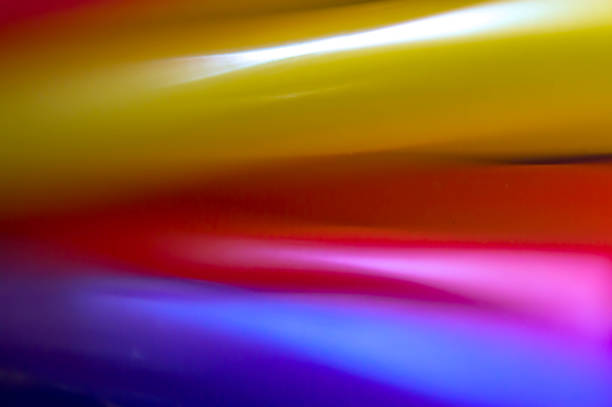 istock Multicolor close up of drinking straws 884674140