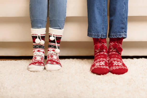 istock couple in knitted socks 884689008
