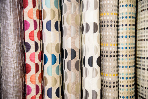 istock Pile of colorful textile on store 884689868