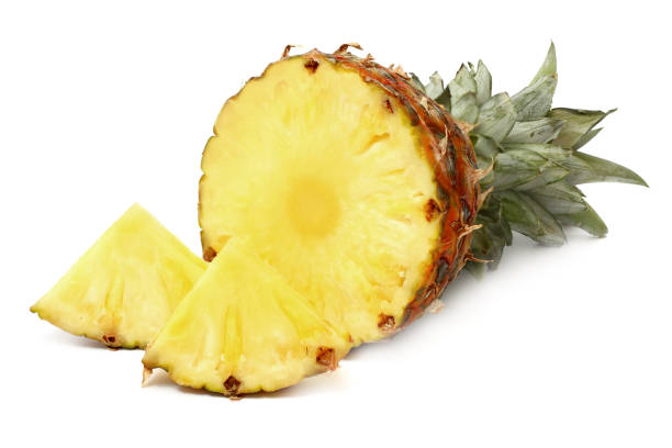 istock Sliced ripe pineapple isolated on white background 884707892