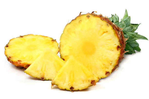 istock Sliced ripe pineapple isolated on white background 884707894
