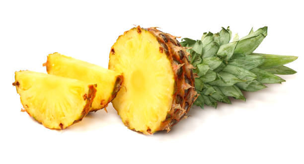 istock Sliced ripe pineapple isolated on white background 884707960