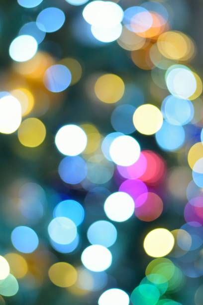 istock Abstract colorful Blurred Christmas illumination lights 884708256