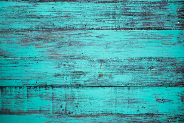 istock Blue color, grunge old scratched wood board textured background 884727056