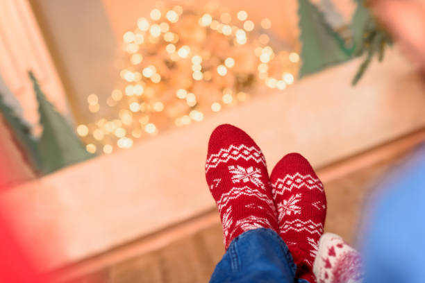istock couple in knitted socks 884727256