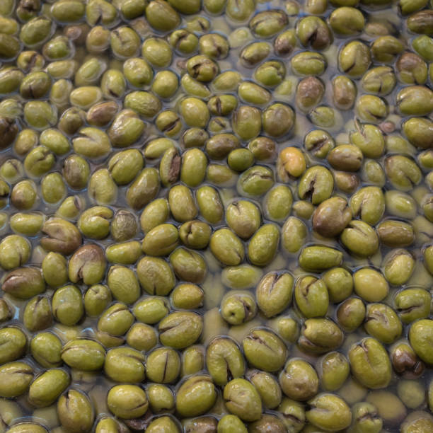 istock Marinated olives in a large saucepan on the market 884727388