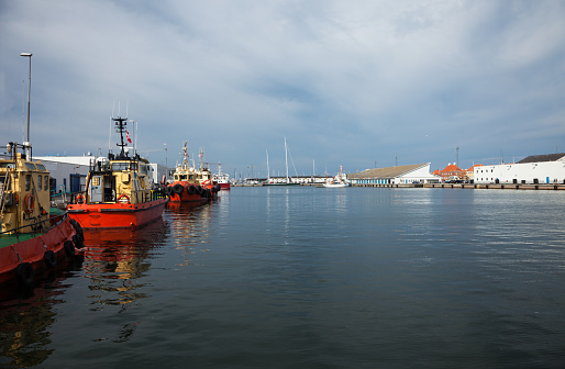 tugboats moored in port