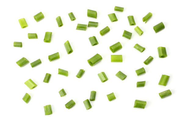 istock cut of green onion isolated on white background 884732244