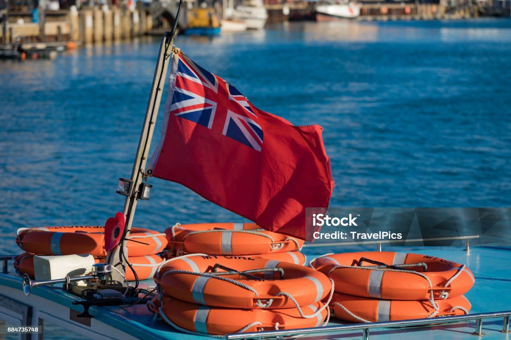 England
Dorset
Weymouth
Portland
Weymouth Harbour, Red ensign England Coastline Stock Photo