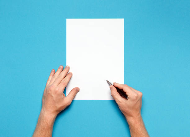 istock Male Hands Is Ready For Drawing With Pen, Top View On Blue Surface. Creativity Concept 884735800