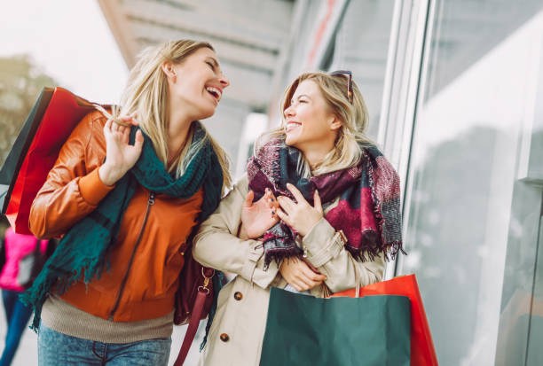 istock Happy friends shopping. 884735970
