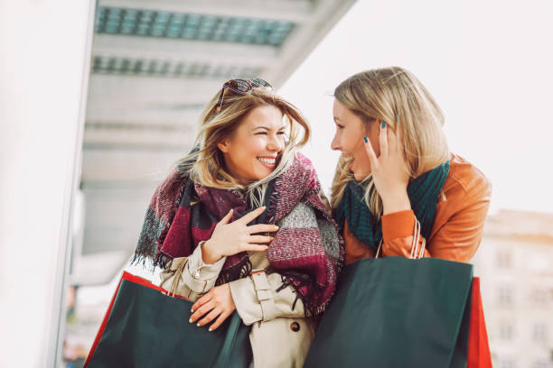 istock Happy friends shopping. 884736958