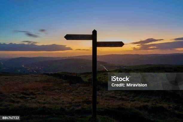 Northsouth Signpost Silhoutte Stock Photo - Download Image Now - Road Sign, Directional Sign, Decisions