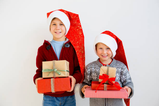 istock Kids celebrating christmas 884769186
