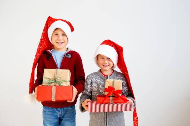istock Kids celebrating christmas 884775480